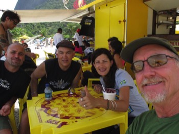  Gathering at a beach kiosk after paraglding 