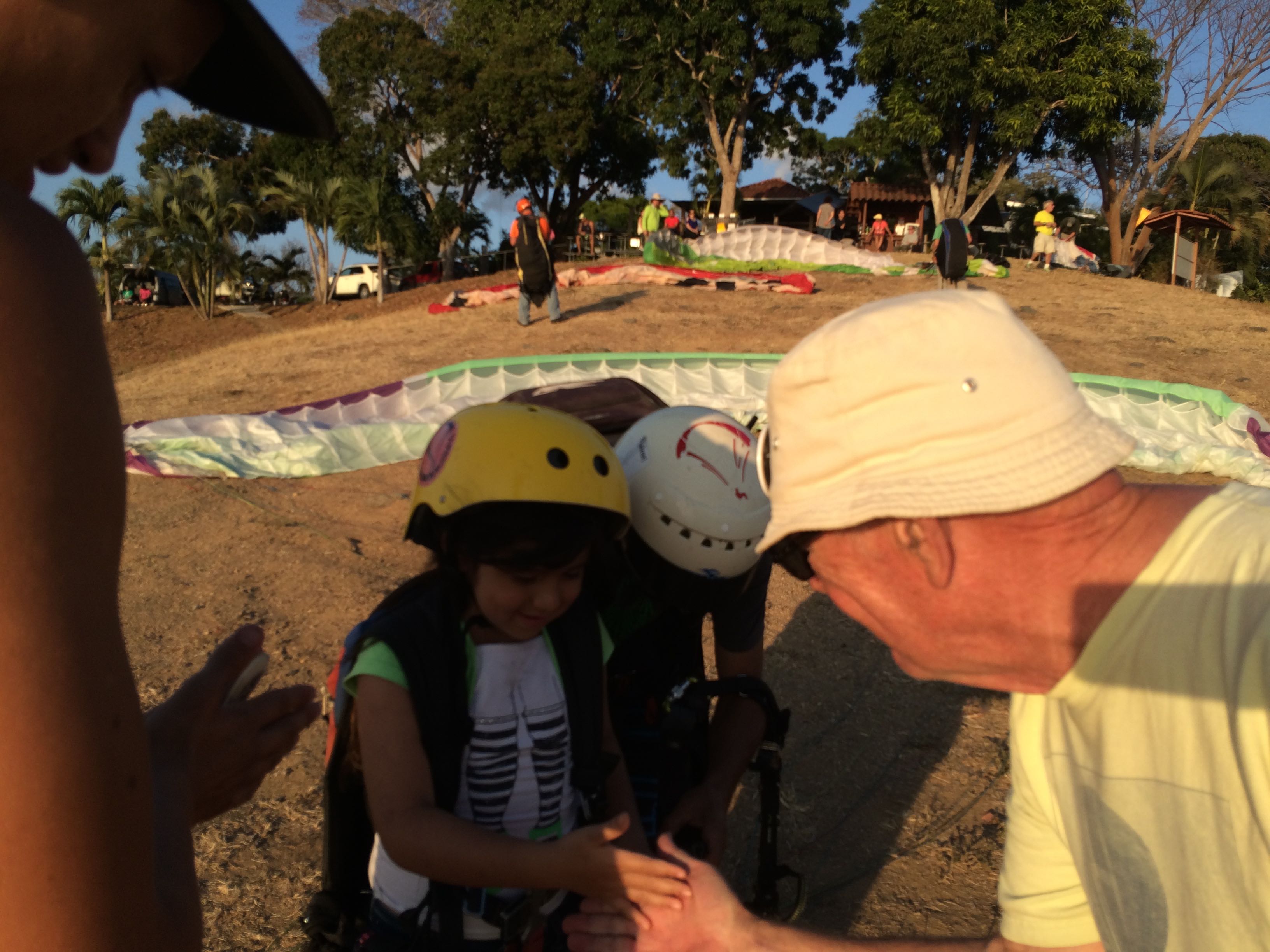  Grampa Ninja congratulating a young paraglider 